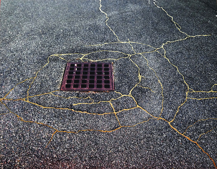Artist Uses Kintsugi to Mend Cracked Streets with Gold